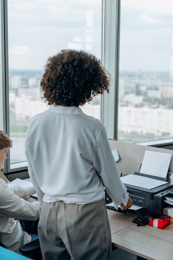 Business professionals collaborating in a modern office setting.